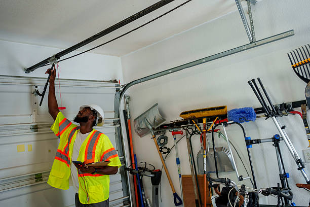 Professional Garage Door Panel Replacement technician working in Leakesville, MS